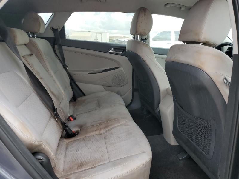 KM8J2CA43KU942391 - 2019 HYUNDAI TUCSON SE GRAY photo 10