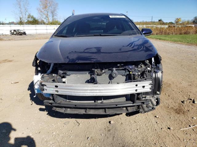 5YFS4MCE6PP141179 - 2023 TOYOTA COROLLA SE ლურჯი ფოტო 5