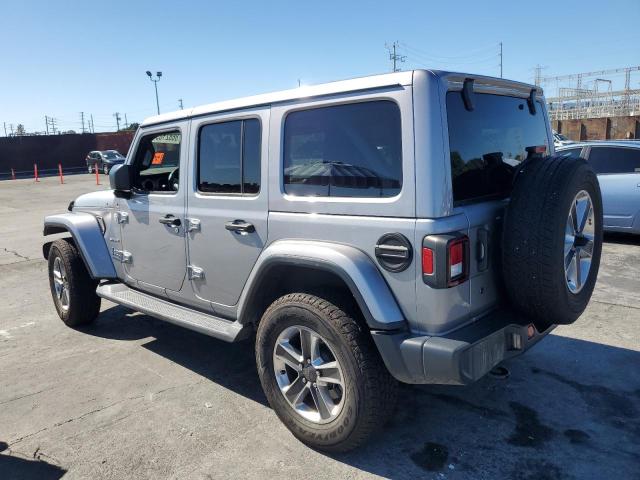 1C4HJXEN0KW565815 - 2019 JEEP WRANGLER U SAHARA Silber Foto 2