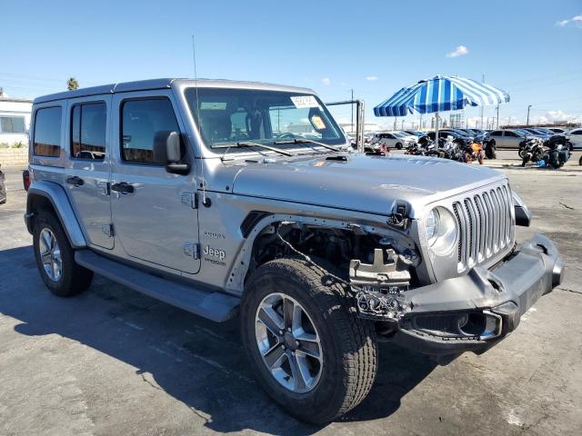 1C4HJXEN0KW565815 - 2019 JEEP WRANGLER U SAHARA Silber Foto 4