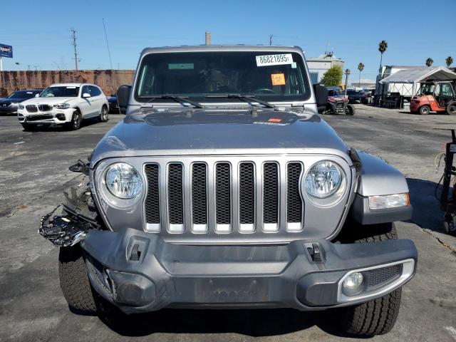 1C4HJXEN0KW565815 - 2019 JEEP WRANGLER U SAHARA Silber Foto 5