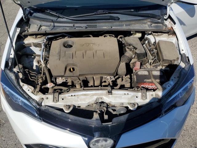 5YFBURHE0JP755125 - 2018 TOYOTA COROLLA L თეთრი ფოტო 11