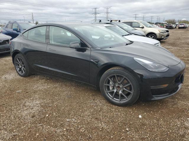 5YJ3E1EA8NF103195 - 2022 TESLA MODEL 3 BLACK photo 4