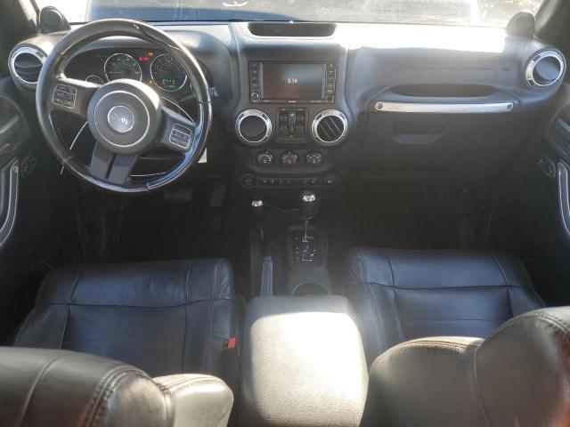 1C4HJWEG5CL202201 - 2012 JEEP WRANGLER UNLIMITED SAHARA შავი ფოტო 8