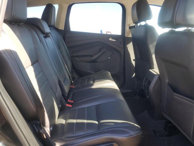 1FMCU9J90GUC90709 - 2016 FORD ESCAPE TITANIUM Schwarz Foto 11