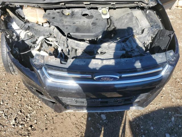 1FMCU9J90GUC90709 - 2016 FORD ESCAPE TITANIUM Schwarz Foto 12