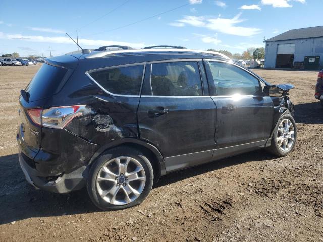 1FMCU9J90GUC90709 - 2016 FORD ESCAPE TITANIUM Schwarz Foto 3