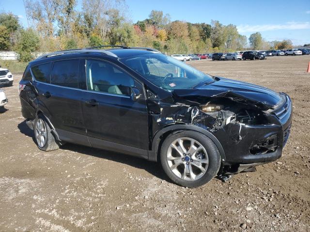 1FMCU9J90GUC90709 - 2016 FORD ESCAPE TITANIUM Schwarz Foto 4