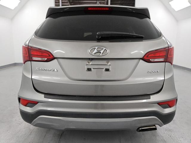 5NMZU3LB2HH016304 - 2017 HYUNDAI SANTA FE S GRAY photo 6