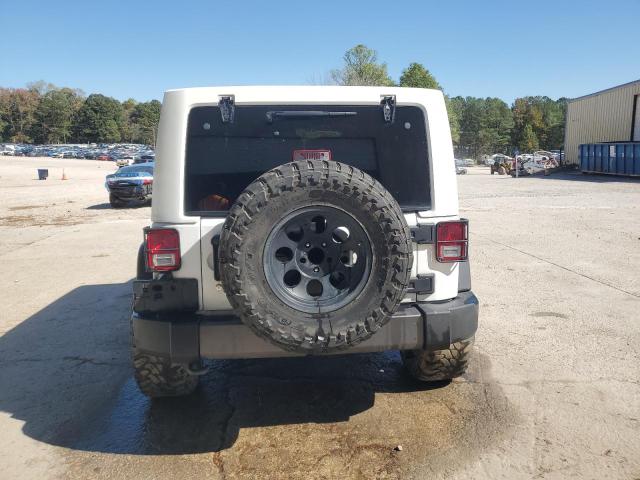 1C4HJWDG2GL121454 - 2016 JEEP WRANGLER U SPORT Белый фото 6