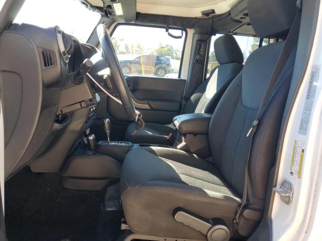 1C4HJWDG2GL121454 - 2016 JEEP WRANGLER U SPORT Белый фото 7