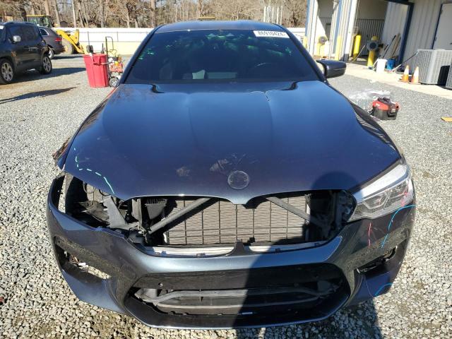 WBSJF0C01LCD36012 - 2020 BMW M5 BASE Schwarz Foto 5