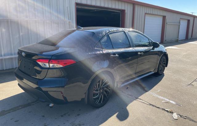 5YFEPMAE8MP200669 - 2021 TOYOTA COROLLA LE BLACK photo 4