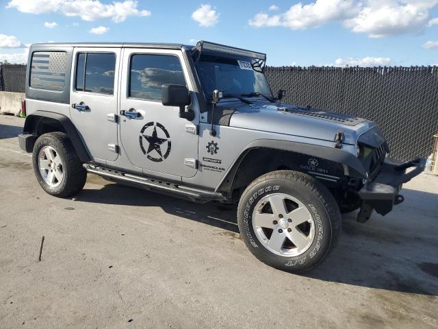 1C4BJWDG5GL335215 - 2016 JEEP WRANGLER U SPORT Մոխրագույն լուսանկար 4