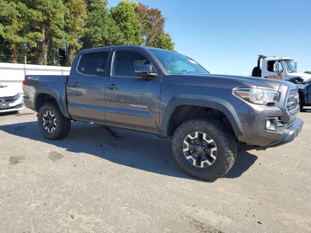 5TFCZ5AN5HX089447 - 2017 TOYOTA TACOMA DOUBLE CAB ნაცრისფერი ფოტო 4