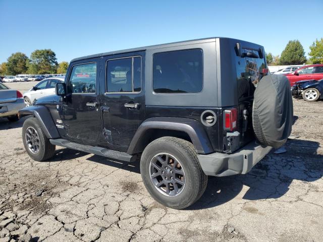 1J4GA591X8L643321 - 2008 JEEP WRANGLER U SAHARA BLACK photo 2