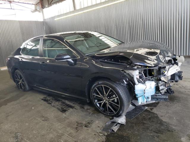 4T1G11AK3PU752114 - 2023 TOYOTA CAMRY SE NIGHT SHADE BLACK photo 4