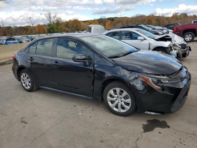 JTDEPMAEXMJ186925 - 2021 TOYOTA COROLLA LE BLACK photo 4