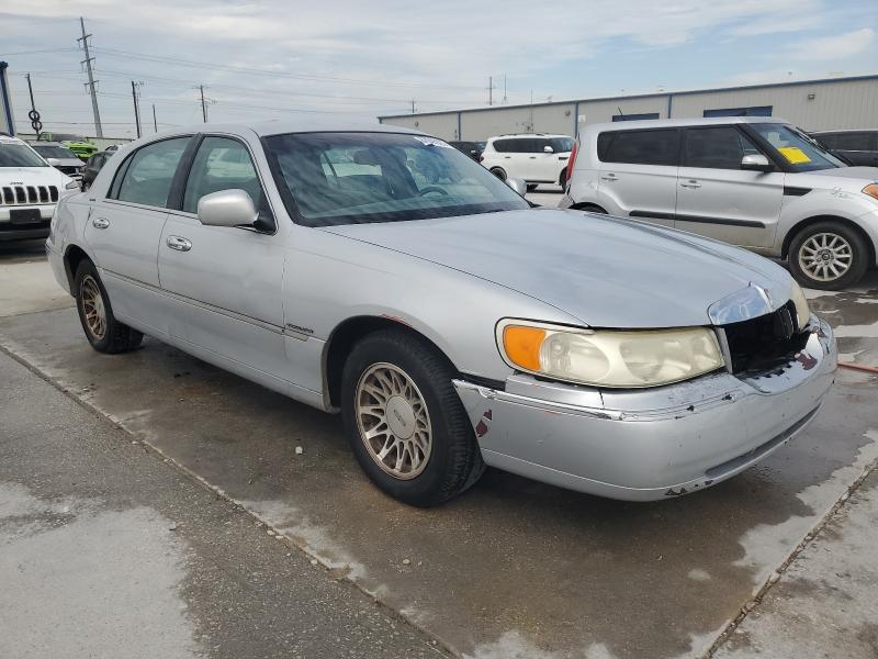 1LNHM82W9YY876405 - 2000 LINCOLN TOWN CAR SIGNATURE Сріблястий фото 4