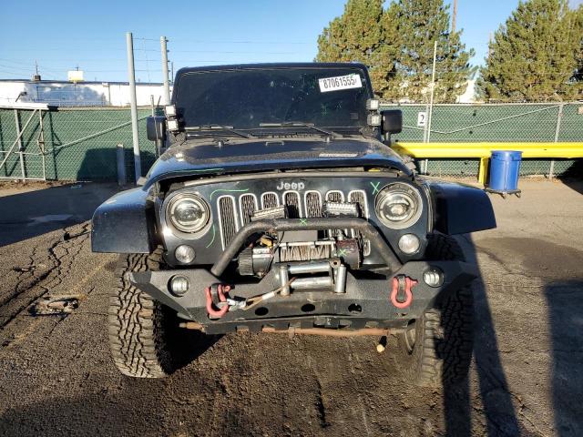 1C4AJWBG4GL214111 - 2016 JEEP WRANGLER SAHARA Schwarz Foto 5