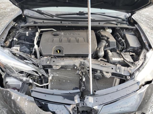 2T1BURHE6JC119941 - 2018 TOYOTA COROLLA L Schwarz Foto 11