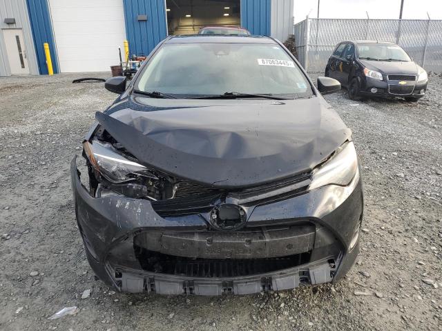 2T1BURHE6JC119941 - 2018 TOYOTA COROLLA L Schwarz Foto 5