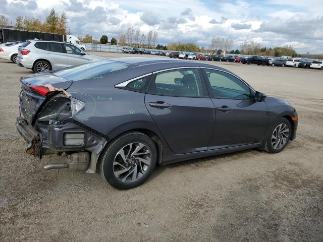 2HGFC2F69JH030637 - 2018 HONDA CIVIC LX ნაცრისფერი ფოტო 3