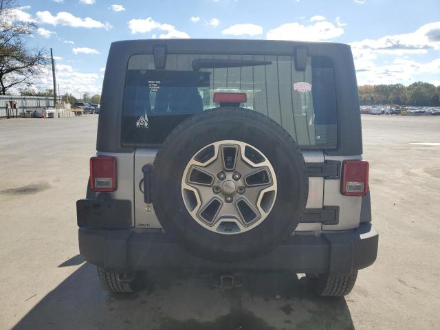 1C4BJWDG2DL588598 - 2013 JEEP WRANGLER U SPORT Argent photo 6