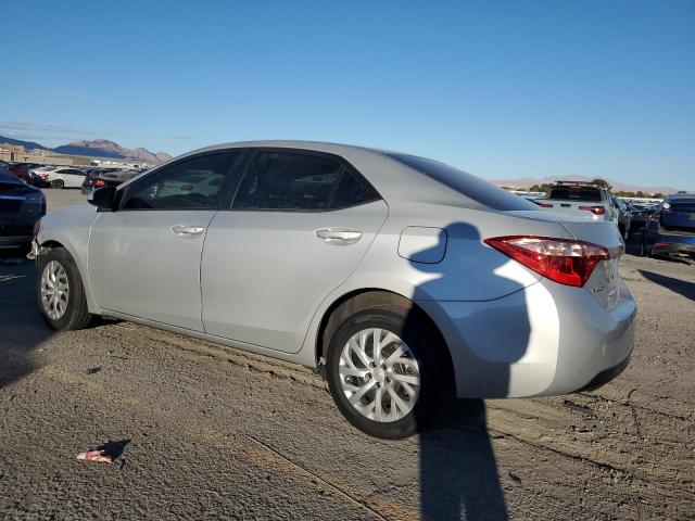 5YFBURHE9KP907162 - 2019 TOYOTA COROLLA L BLUE photo 2