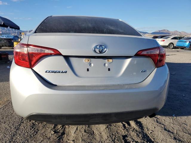 5YFBURHE9KP907162 - 2019 TOYOTA COROLLA L BLUE photo 6