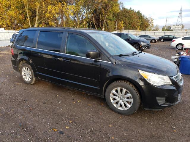 2C4RVABG5CR292697 - 2012 VOLKSWAGEN ROUTAN SE BLACK photo 4