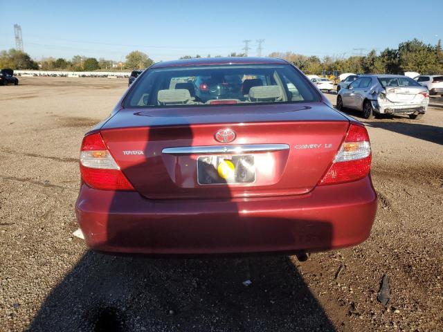 JTDBE32K220128205 - 2002 TOYOTA CAMRY LE RED photo 6