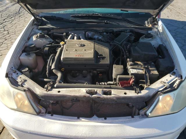 4T1BF28B62U211140 - 2002 TOYOTA AVALON XL WHITE photo 11