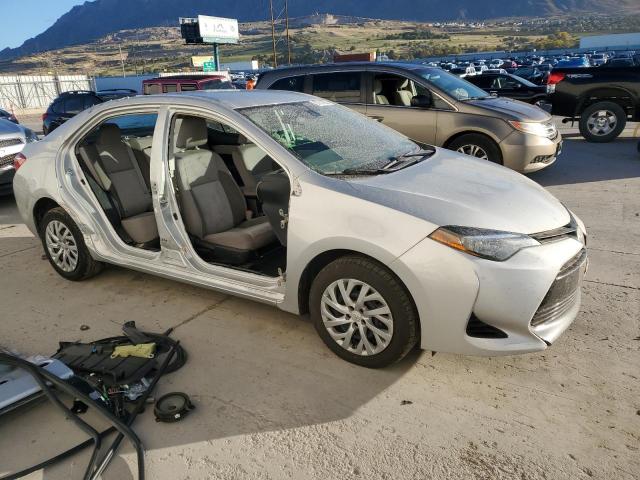5YFBURHE2KP907939 - 2019 TOYOTA COROLLA L فضي صورة 4