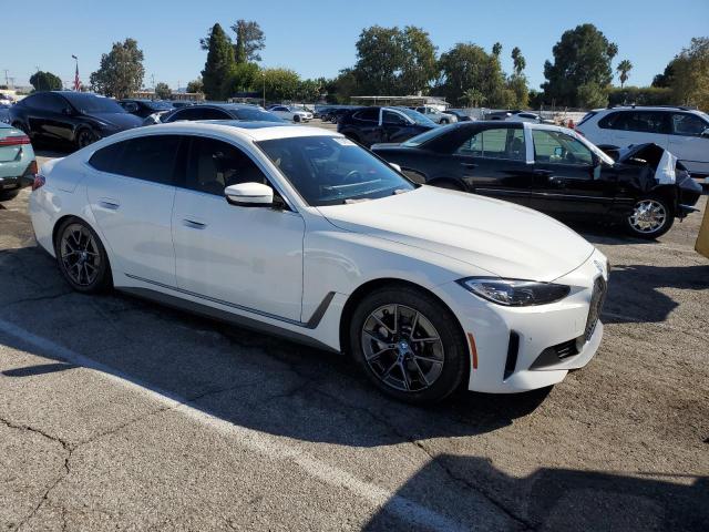 WBY43AW04RFR59223 - 2024 BMW I4 EDRIVE 35 WHITE photo 4