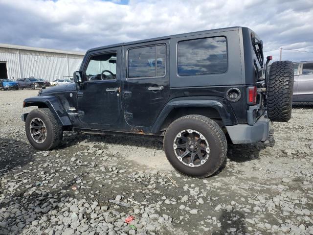 1J4BA5H11AL153027 - 2010 JEEP WRANGLER U SAHARA BLACK photo 2