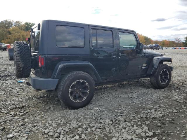 1J4BA5H11AL153027 - 2010 JEEP WRANGLER U SAHARA BLACK photo 3