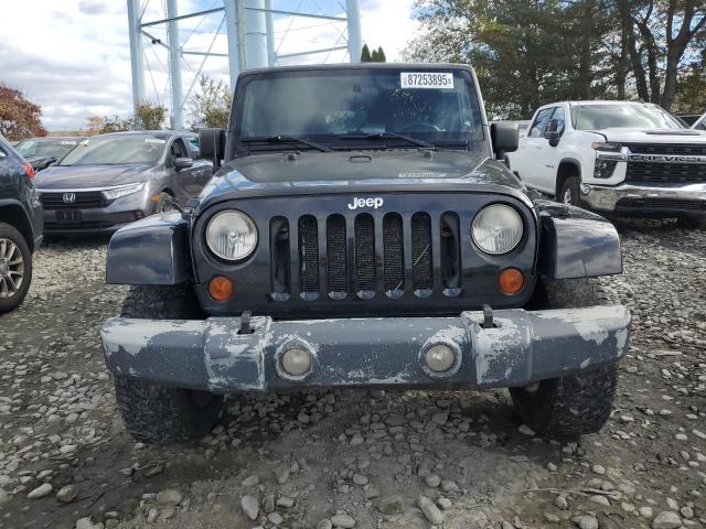 1J4BA5H11AL153027 - 2010 JEEP WRANGLER U SAHARA BLACK photo 5