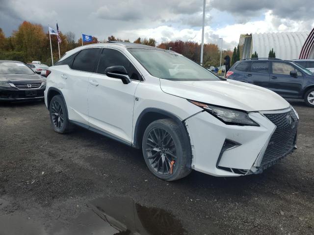 2T2BZMCA1HC129663 - 2017 LEXUS RX 350 BASE BLACK photo 4