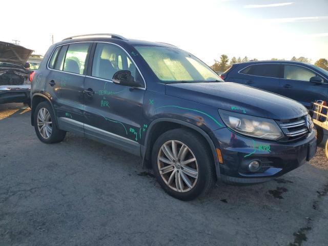 WVGAV7AX8GW565173 - 2016 VOLKSWAGEN TIGUAN S BLUE photo 4