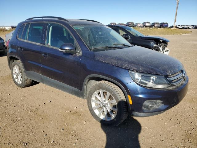 WVGCV7AX2CW534360 - 2012 VOLKSWAGEN TIGUAN S Blau Foto 4