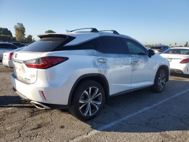 2T2ZZMCA7HC042882 - 2017 LEXUS RX 350 BASE WHITE photo 3