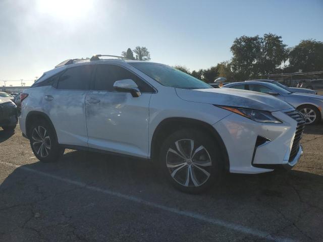 2T2ZZMCA7HC042882 - 2017 LEXUS RX 350 BASE WHITE photo 4