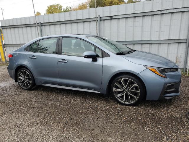 5YFB4MBE3NP111815 - 2022 TOYOTA COROLLA SE Gris foto 4