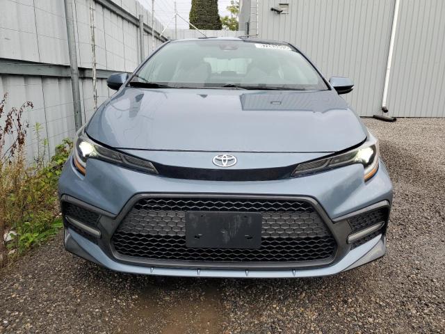 5YFB4MBE3NP111815 - 2022 TOYOTA COROLLA SE Gris foto 5