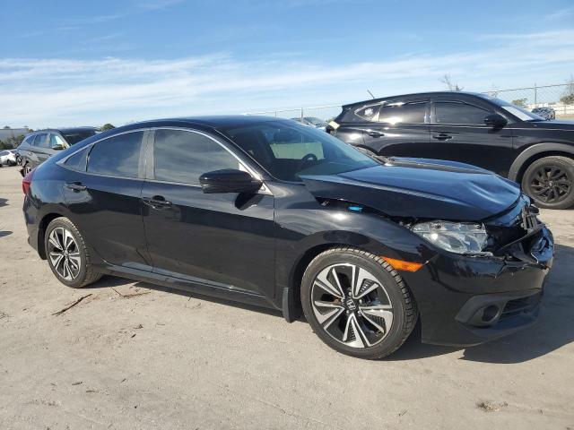 19XFC1F77GE203626 - 2016 HONDA CIVIC EXL შავი ფოტო 4