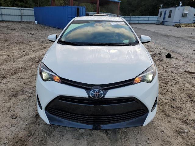 5YFBURHE1JP763119 - 2018 TOYOTA COROLLA L თეთრი ფოტო 5