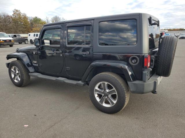 1C4HJWEG7CL104691 - 2012 JEEP WRANGLER U SAHARA 黑色 照片 2