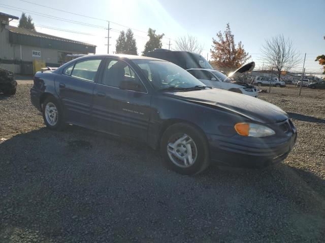 1G2NE52T91M554454 - 2001 PONTIAC GRAND AM SE BLUE photo 4