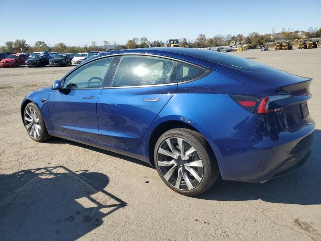 5YJ3E1EB3SF926895 - 2025 TESLA MODEL 3 ლურჯი ფოტო 2